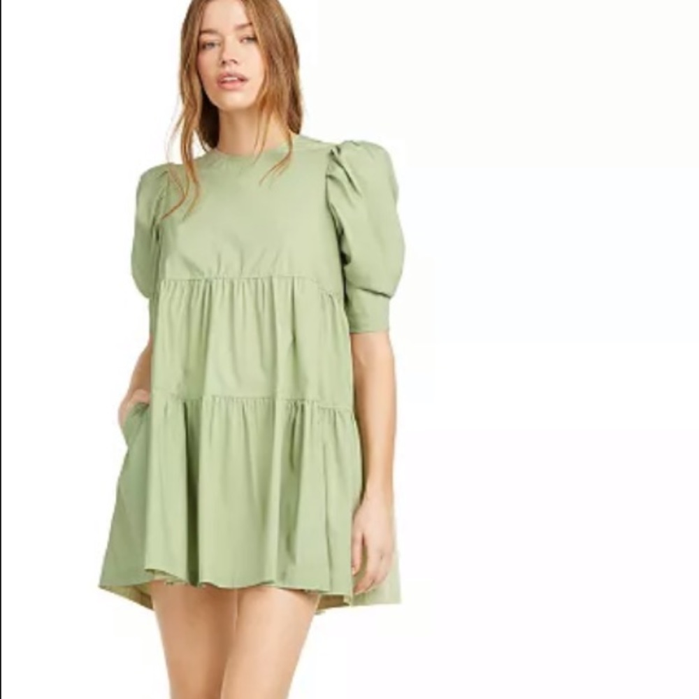 Danielle Bernstein green mini dress